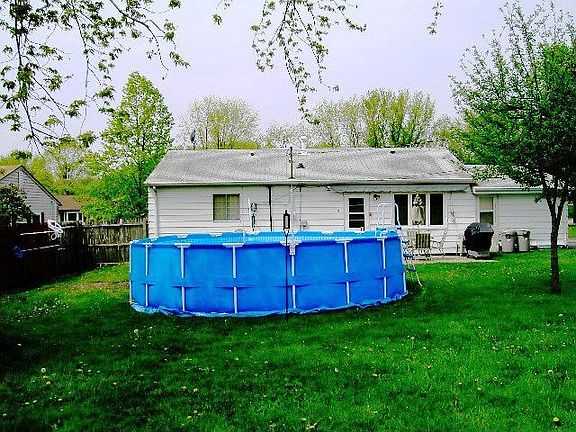 Summer view fenced back yard