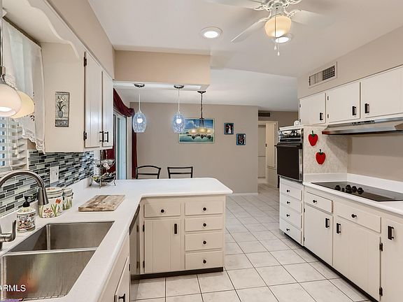 4th image of 10736 W VENTURI Drive NW
