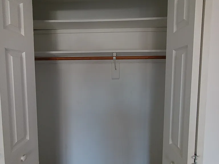 double door closet in the second bedroom