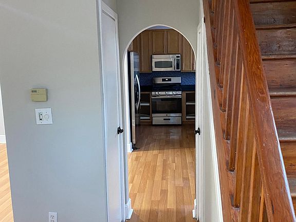 Entry view to kitchen and upstairs