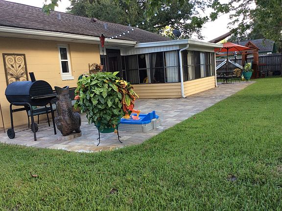Large pave red back patio