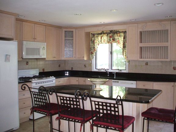 Kitchen with Island and Granite Countertops