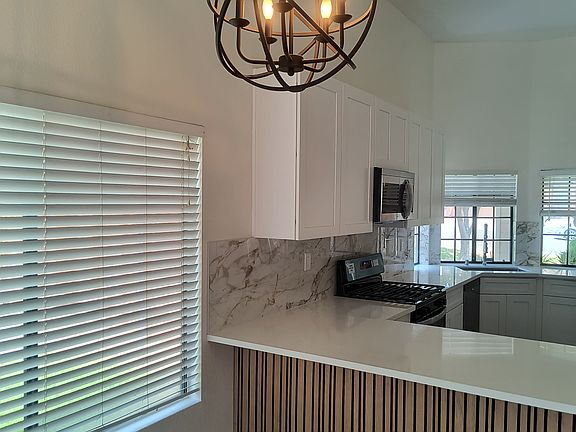 VIEW OF KITCHEN FROM LARGE FAMILY ROOM