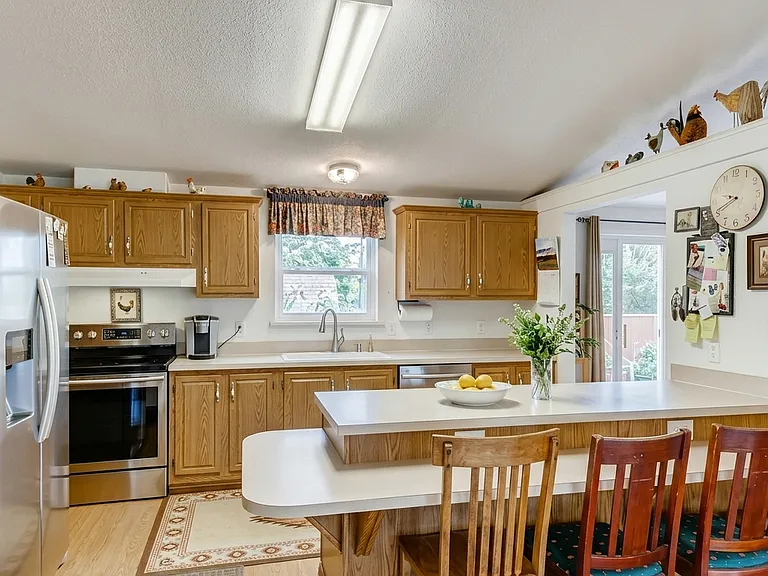 9040 W 64th Pl — Photo 2