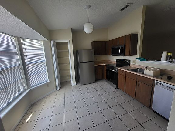 Kitchen featuring new appliances