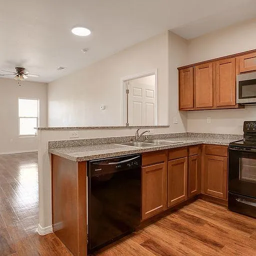 All units have similar kitchen finishes. Kitchen lay-out and flooring varies between unit styles.