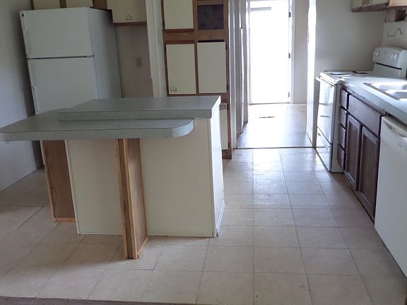 kitchen with appliances and side door