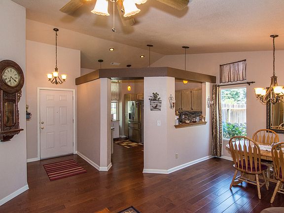 Vaulted entry, wood floors