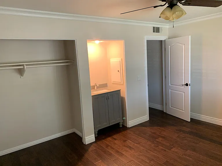 One bedroom has private vanity installed.