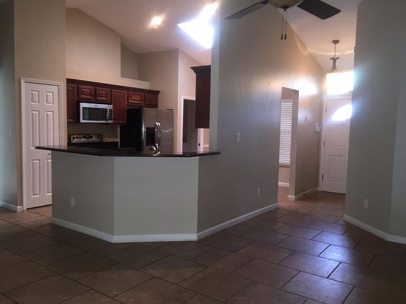Kitchen and foyer. View when standing in family/great room and looking at front door.