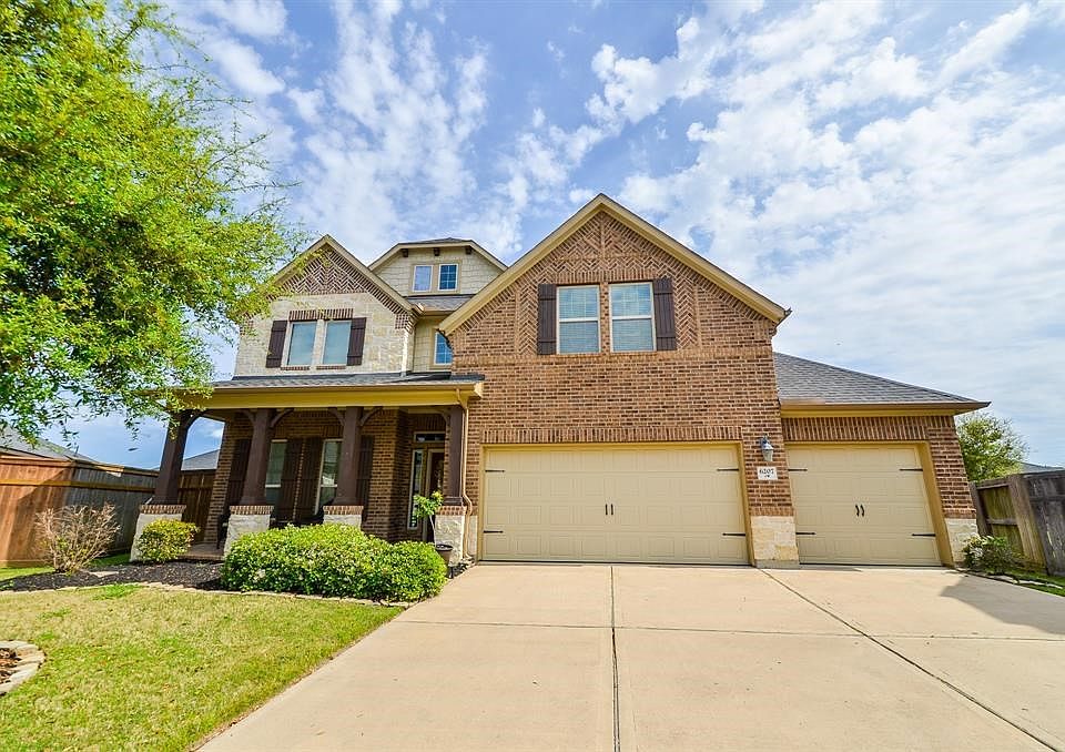 Welcome home!  Stunning 2 story home with brick and stone front elevation on a cul-de-sac!