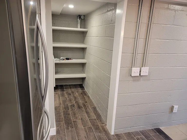 Hallway and pantry off of kitchen