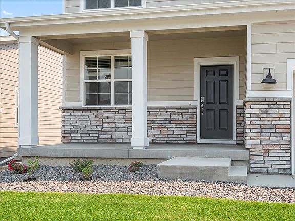 Evergreen floorplan exterior image taken at a Meritage Homes community in Windsor, CO.