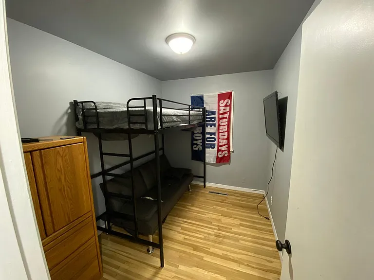 This room is smaller than it appears in the photo. The bed is an extra long twin.