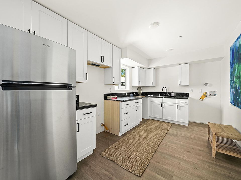 Kitchen has fridge, dishwasher and washer/dryer hookups. And is brand new!