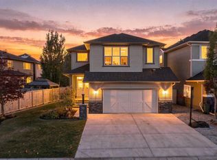 62 N Cimarron Springs Cir, Okotoks, AB T1S 0M2
