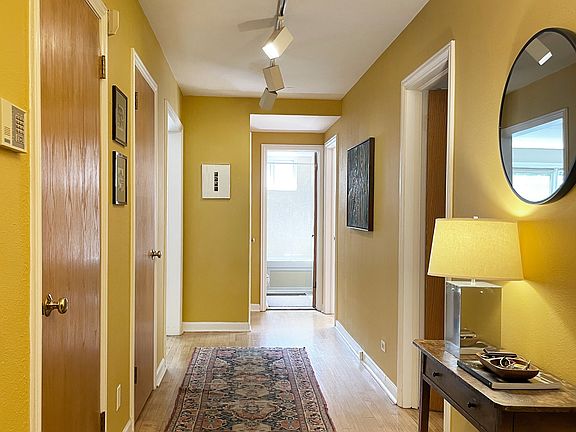 Entry Hallway with 3 Closets