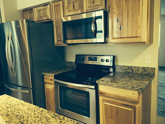 Kitchen with stainless steel appliances and granite countertops