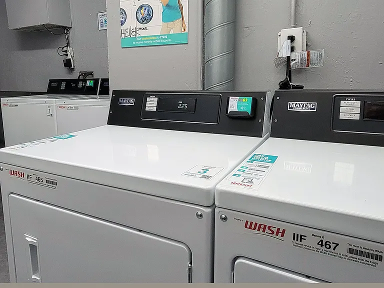 Laundry room dryers at The Carlton Apartments in Hollywood, California.