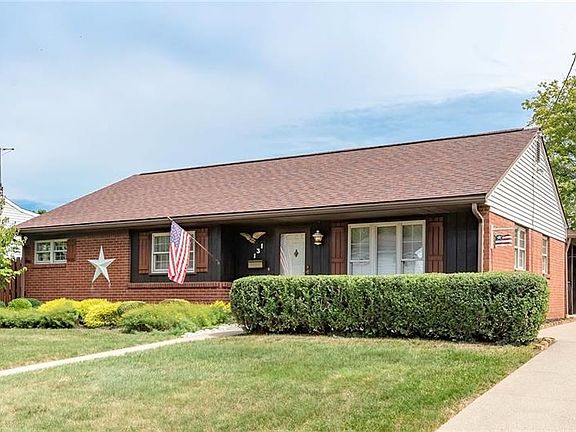 Beautiful brick ranch with nicely landscaped front yard.