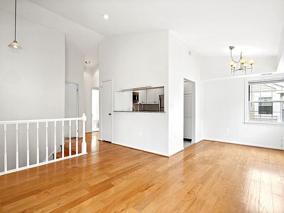 Cathedral ceilings! Freshly painted, separate dining and living areas