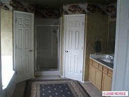 Huge Master Bath, 2 sinks 2 closets, whirlpool bath.