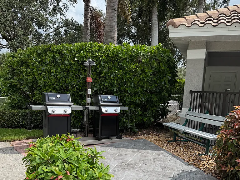 Grills at Pool included for your use.

There is also a grill in your parking lot.