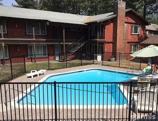 Heated Pool with seating and lounge chairs. Practically priv