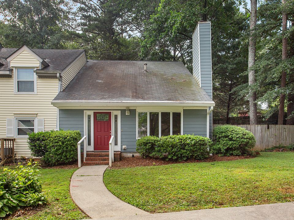 Home with 3 parking spots.