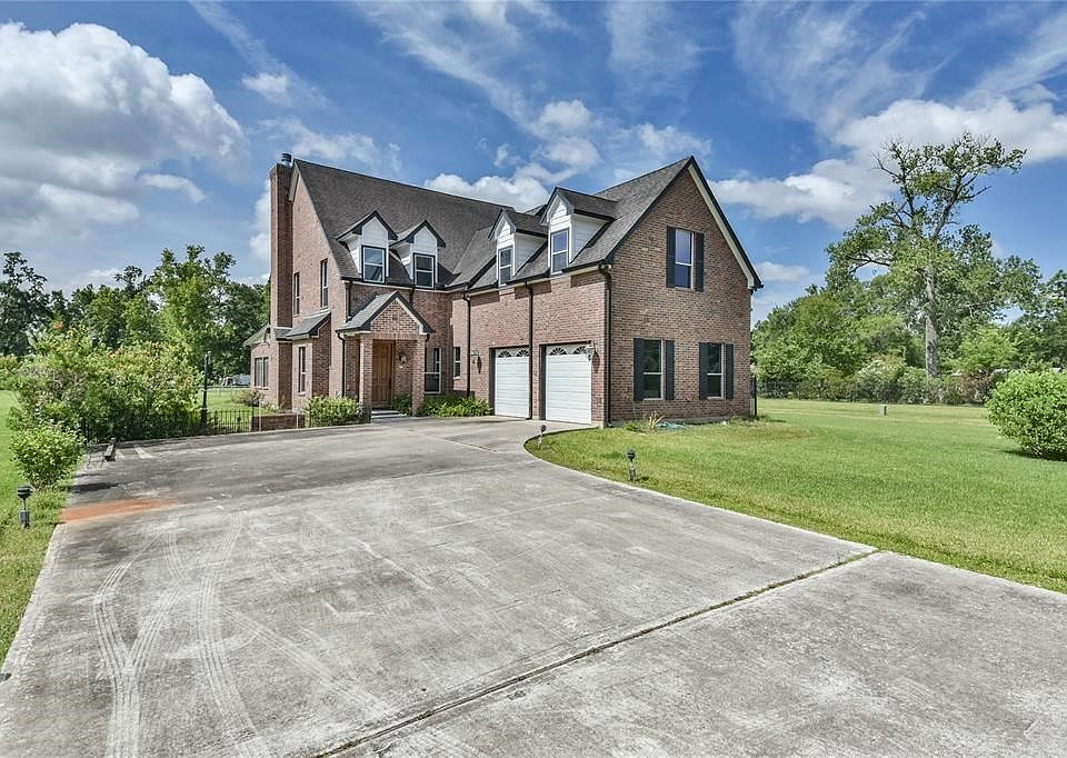 1205 Mansfield Dr. 2006, custom home, situated on 3.3 acres.