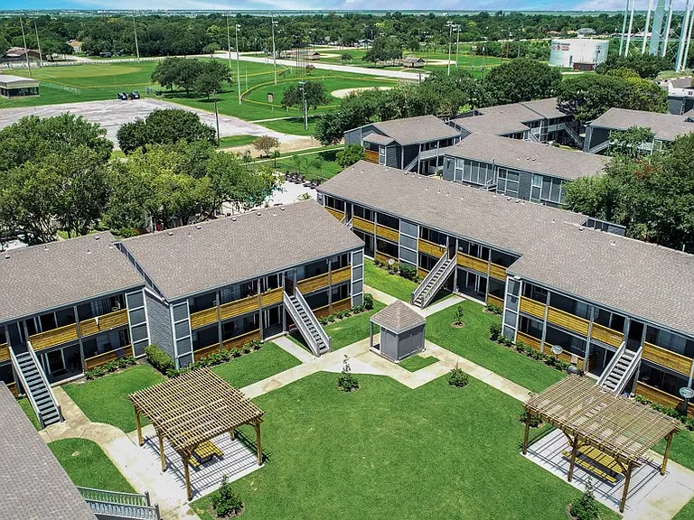 Texas City apartments with spacious community layout and landscaped grounds
