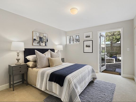 Bedroom on 1st floor with personal bathroom and access to backyard
