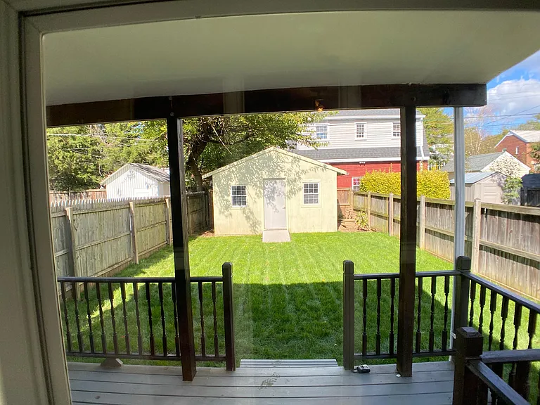 Backyard fully regraded and sodded. Covered patio with access from kitchen and bedroom 3. Very large storage shed in the back, hold all your gear - bikes, kayaks, etc. No need for a lawnmower, though - lawn service is included in the rent!