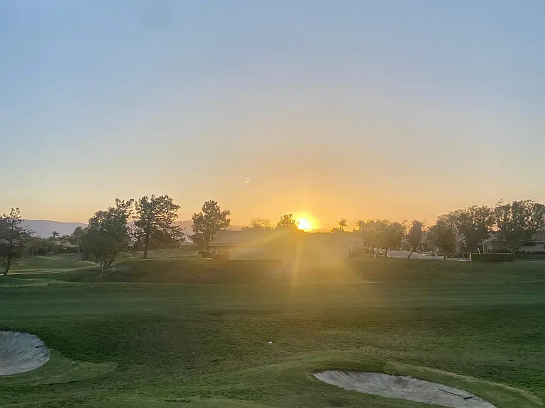 Enjoy the beautiful morning sunrise from your kitchen window and private patio on the sixth fairway. Coffee in hand.