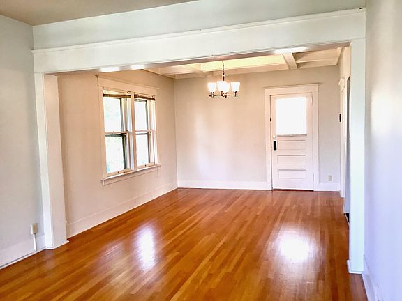 Spacious dining room with coffered ceilings