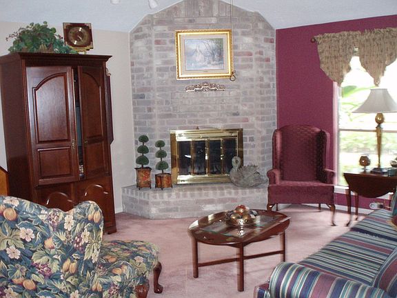 View of living area from kitchen w/11' ceilings in entry, dining and living.