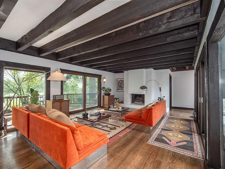 Living room with wood burning fireplace