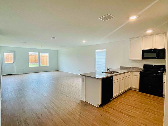 Large open layout kitchen and living area