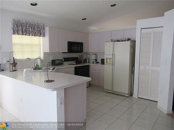 KITCHEN - Spacious kitchen, breakfast bar, pantry.