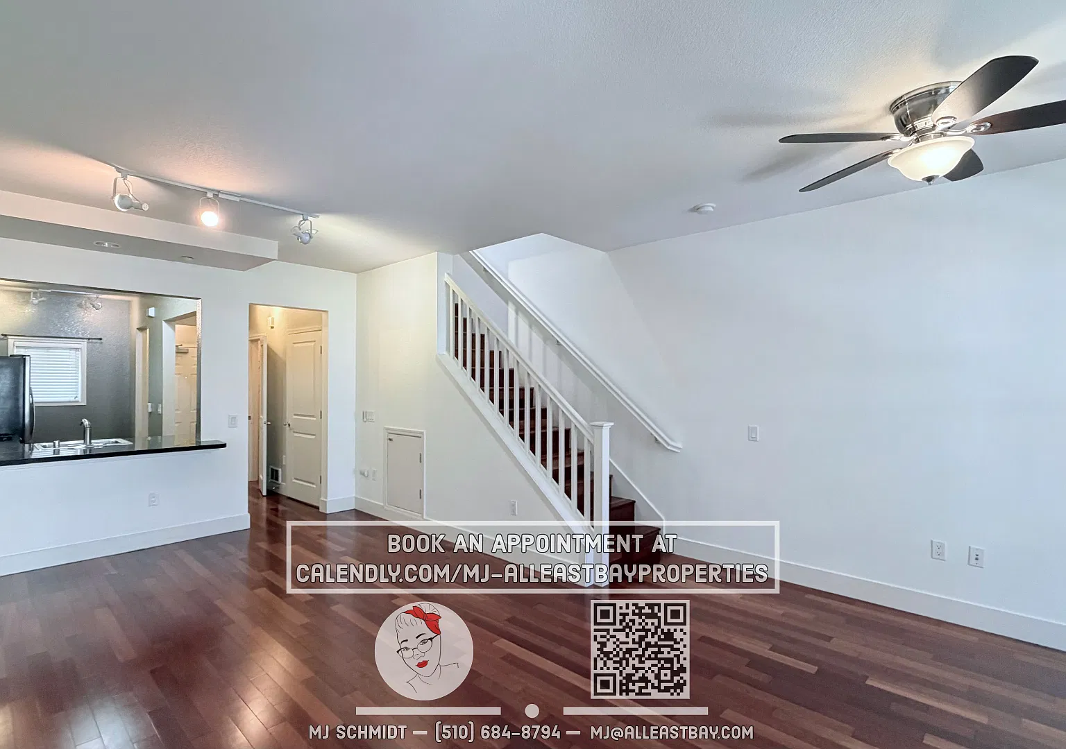 2-bed, 1.5-bath two-story condo, with rich hardwood floors, a modern kitchen, and spacious bedroo... — Photo 1