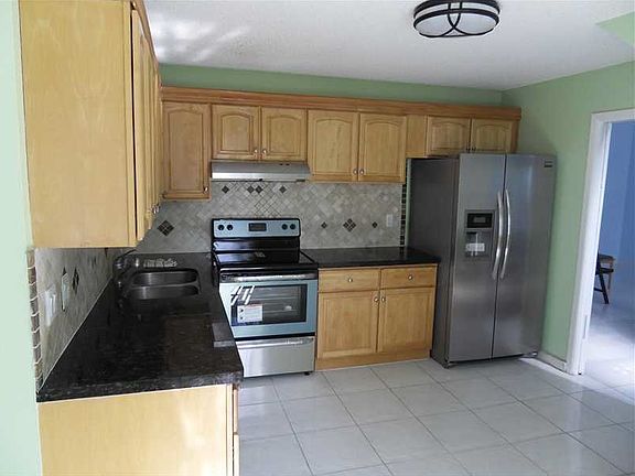 4th image of 9932 NW 46th Ct