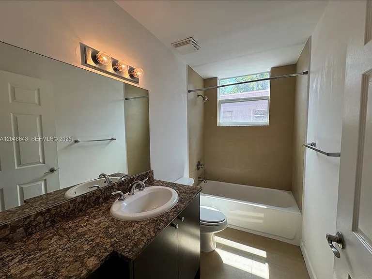 529 NE 62nd St #203 — Photo 11