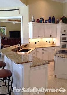Kitchen
						:
						Granite Countertops, Deep Blanco Sink, Moen Touch Faucet