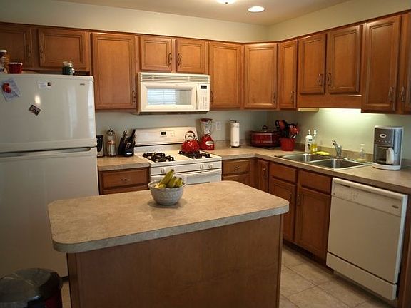 Spacious kitchen with island and updated appliances.