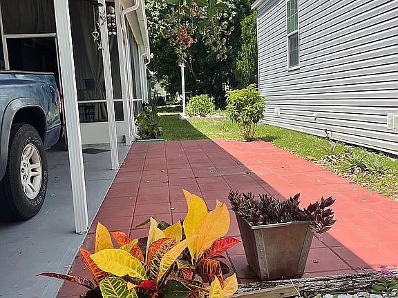 Sitting area next to carport