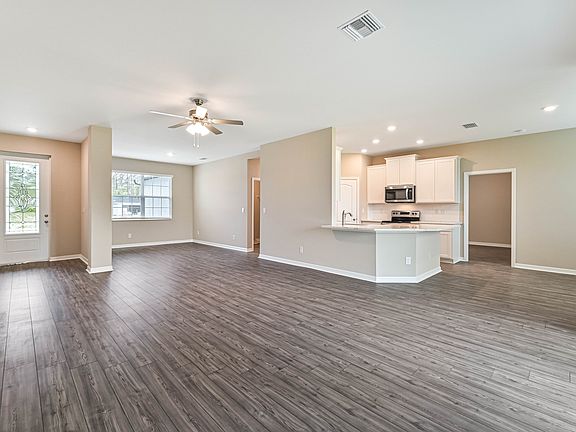 The open concept floor plan is perfect for entertaining friends and family