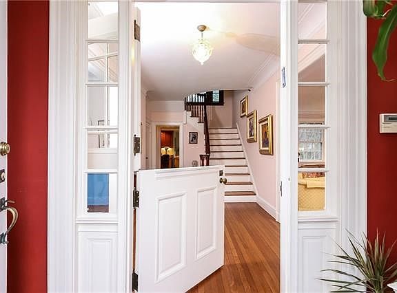 Welcome to this gracious Colonial. After entering the vestibule and passing through the Dutch door you will find yourself in the