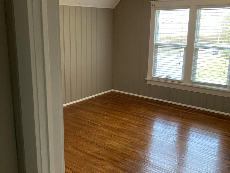 Bedroom upstairs with beautiful original hardwood floors