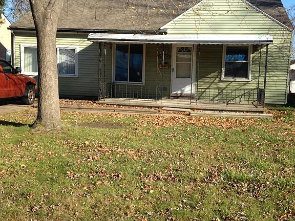 front with large covered porch