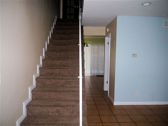 Office and bedrooms upstairs, kitchen and patio straight bac